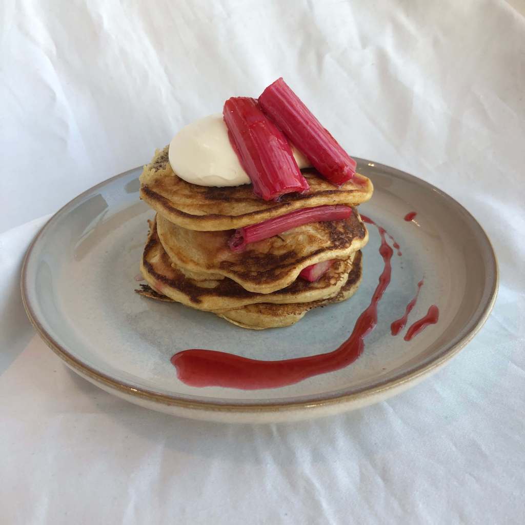 Pancakes served with rhubarb